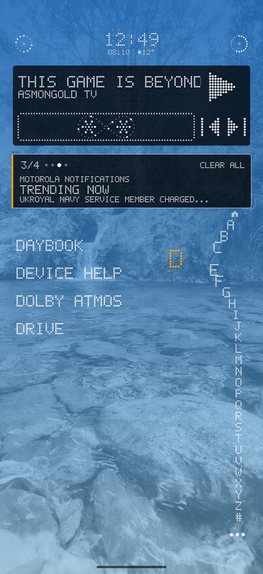 Vertical alphabet strip down the right edge of a blue home screen, with the letter D lit in orange